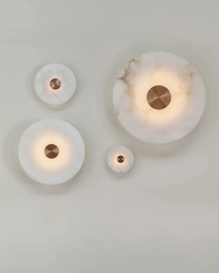 Bide wall lights photographed on a plain wall